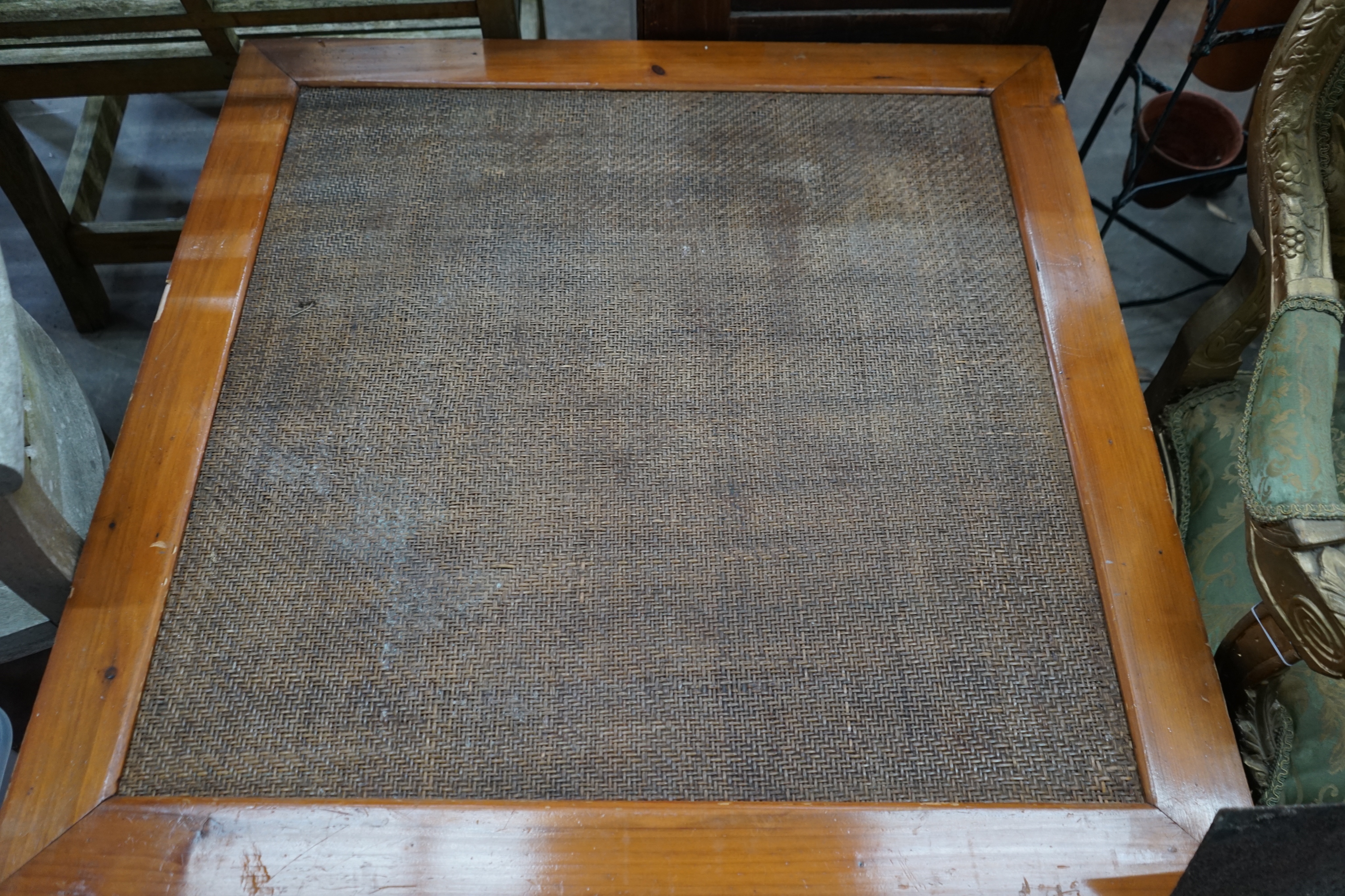 A Chinese caned pine and hardwood square low table, width 97cm height 51cm